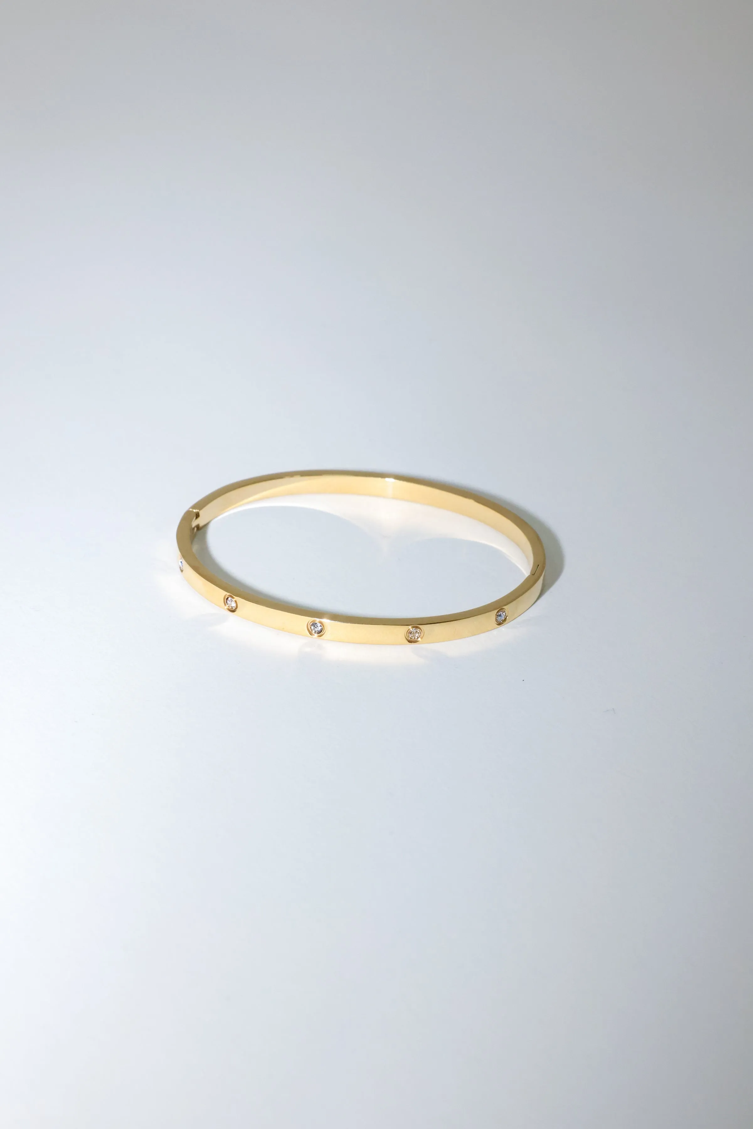 Thin Gold Toned and Crystal Bangle