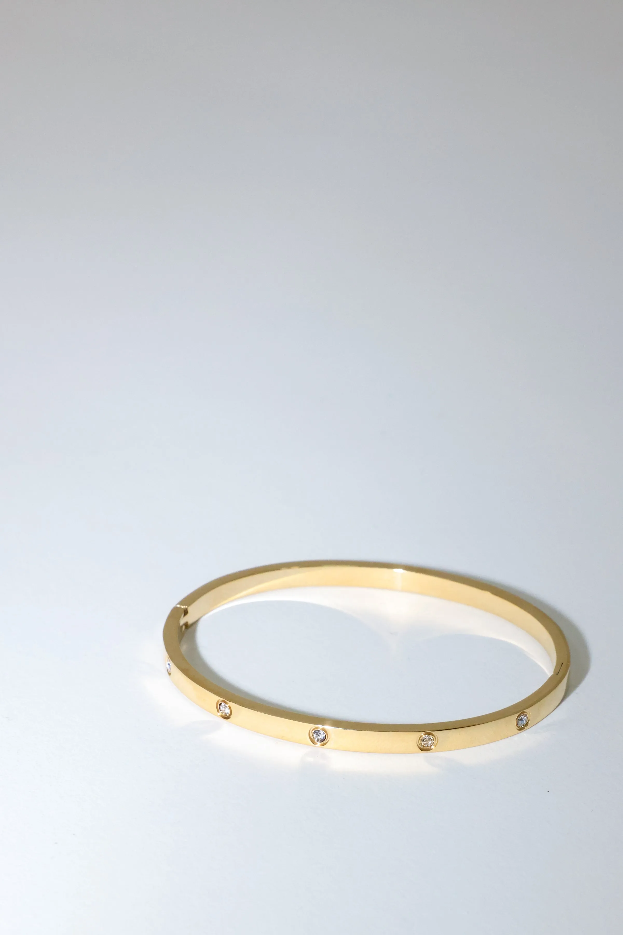 Thin Gold Toned and Crystal Bangle